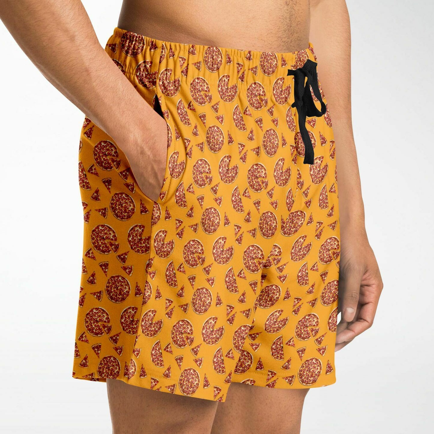 Men’s shorts featuring a pizza design of pizza pies and pizza slices on a yellow/orange background with two side pockets.