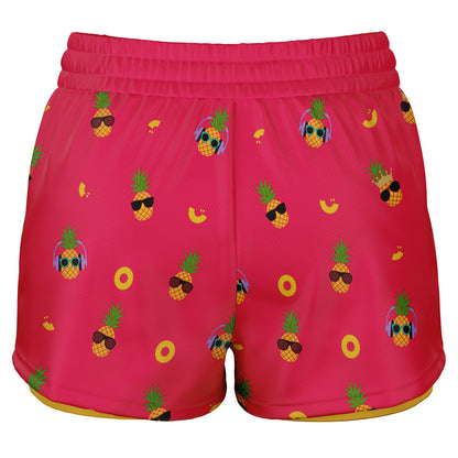 Women's 2-in-1 Shorts. These fun shorts feature a pink background with pineapples wearing a variety of sunglasses, and a yellow under-short with a hidden phone pocket.