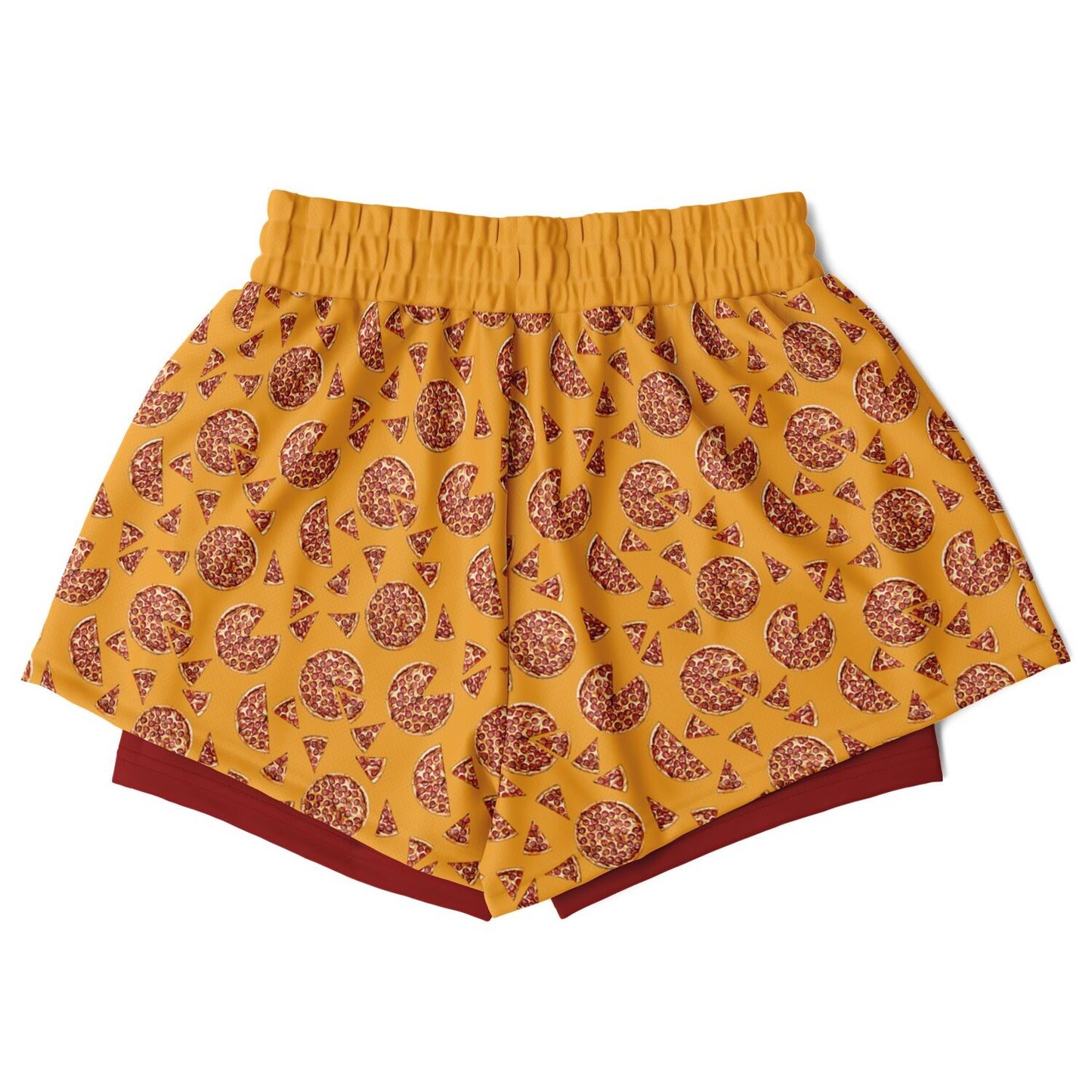 Women's shorts featuring a pizza design of pizza pies and pizza slices on a yellow background with a red undershort.