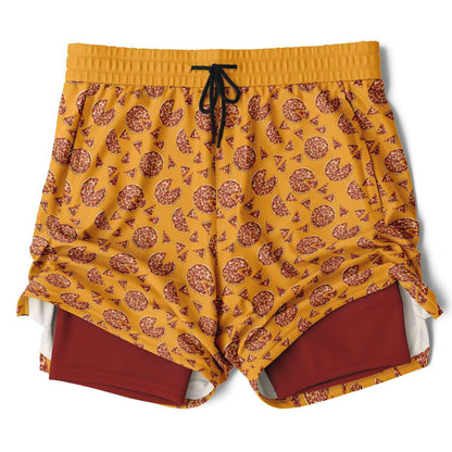 Men's shorts featuring a pizza design of pizza pies and pizza slices on a yellow background with a red under short.