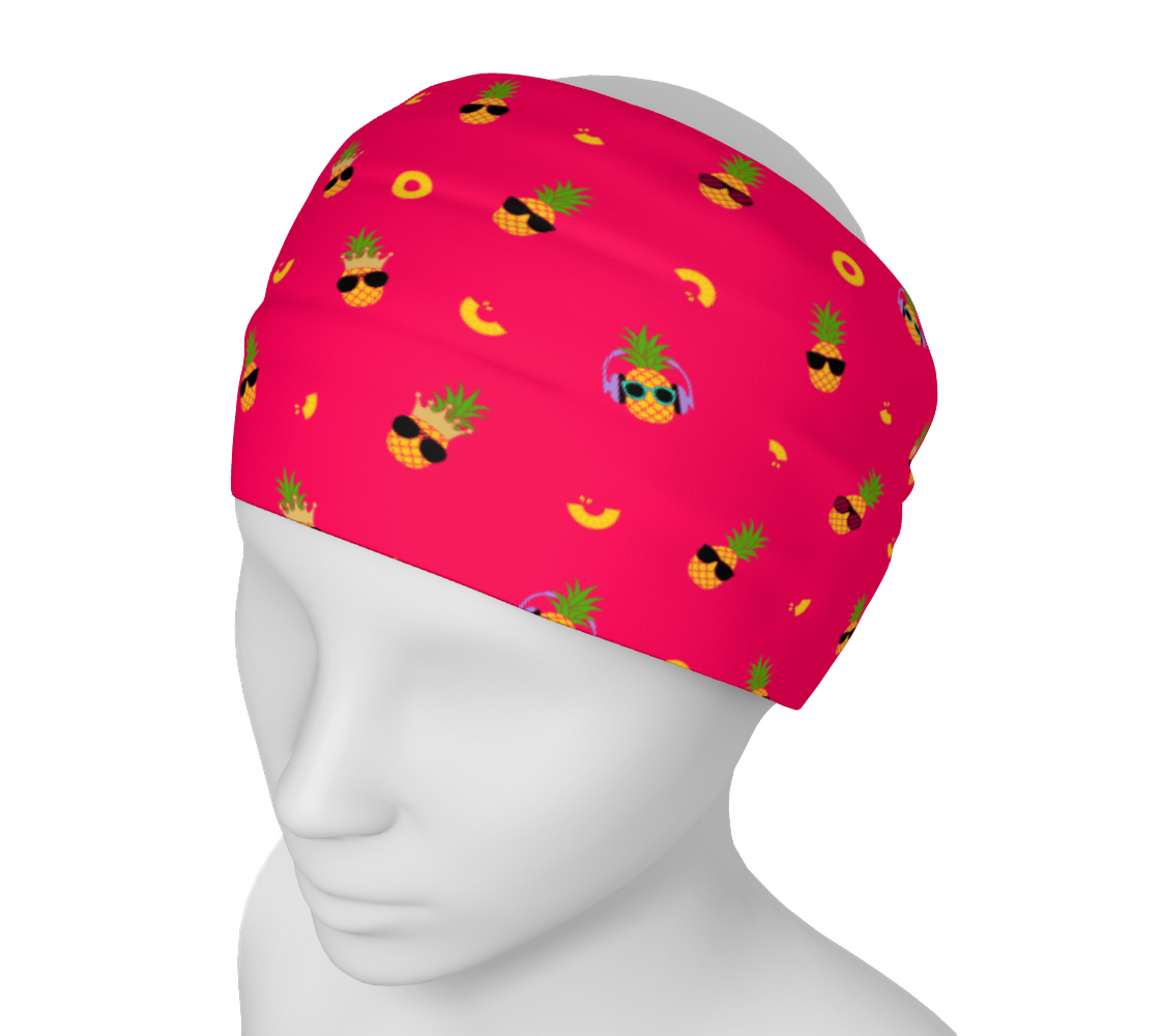 Pink headband/neck gaiter with pineapples wearing sunglasses.