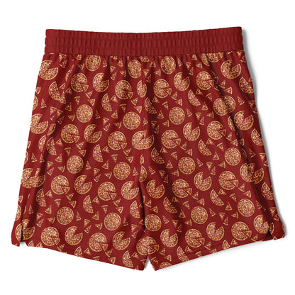 Men's shorts featuring a pizza design of pizza pies and pizza slices on a red background with an orange/yellow under short.