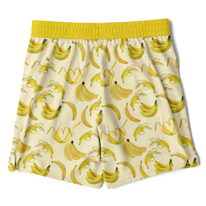 Men's 2-in-1 Shorts. These fun yellow workout shorts feature a banana design. Shorts have a drawstring, zip up side pockets, and hidden phone pocket.