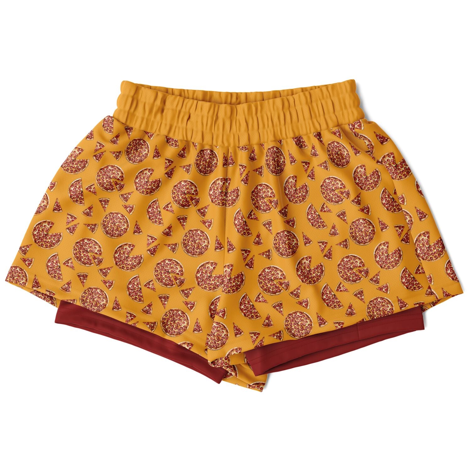 Women's shorts featuring a pizza design of pizza pies and pizza slices on a yellow background with a red undershort.