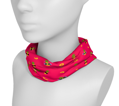 Pink headband/neck gaiter with pineapples wearing sunglasses.